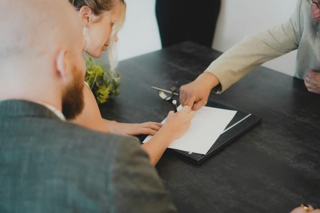 someone signing a contract